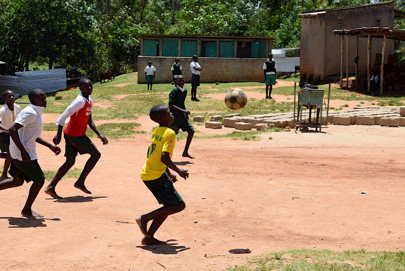 kenyan school children playing football